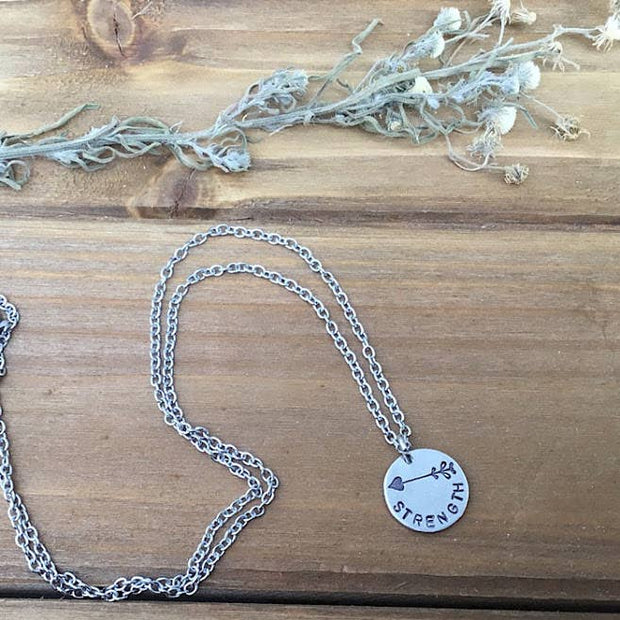 Strength arrow stamped charm necklace