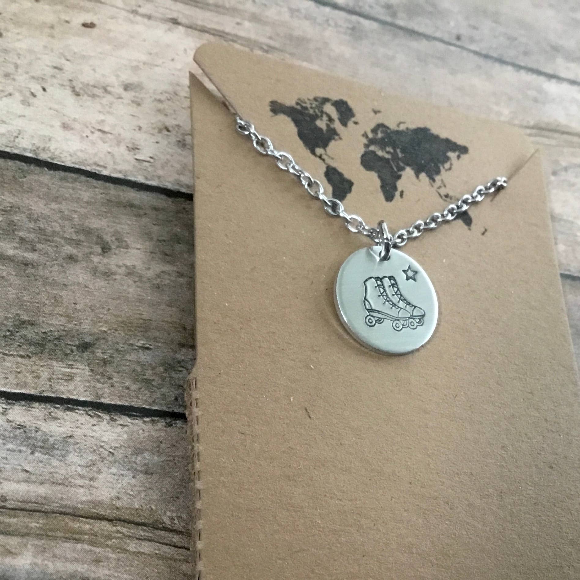 Retro roller skates charm necklace