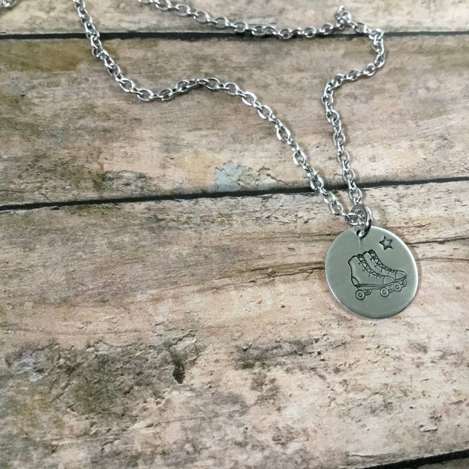 Retro roller skates charm necklace