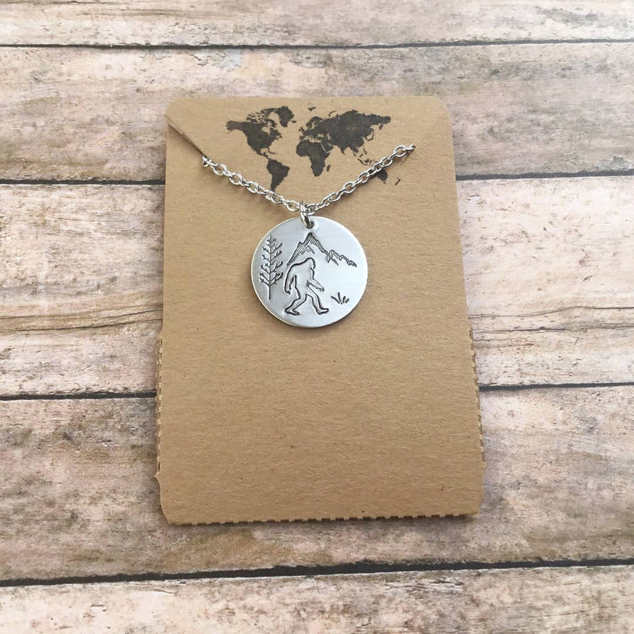 Sasquatch forest scene circular pendant