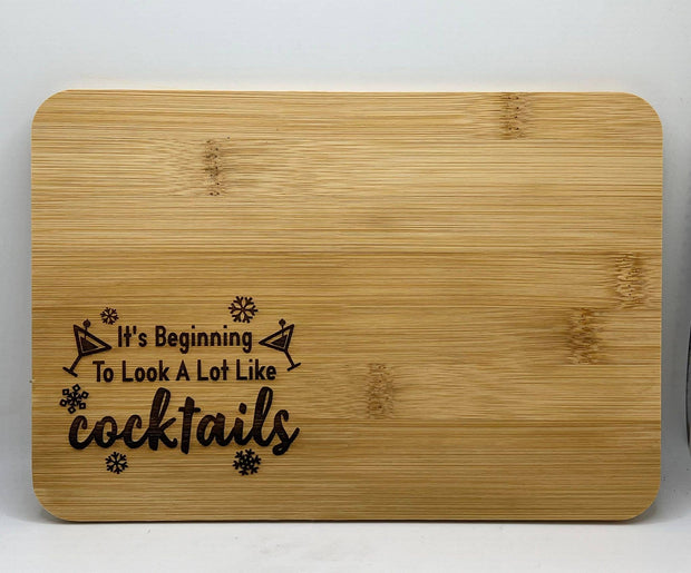 It's Beginning To Look A Lot Like Cocktails Cutting Board